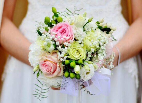 Bride holding a floral bridal bouquet